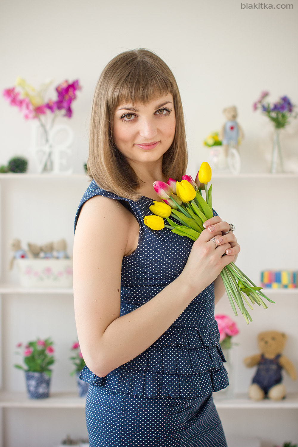 smiling girl with tulips