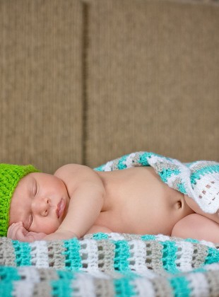 newborn babyboy, 14 days in a frog hat